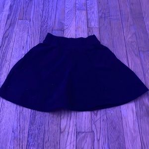 Black, kids size medium, uniform skirt
